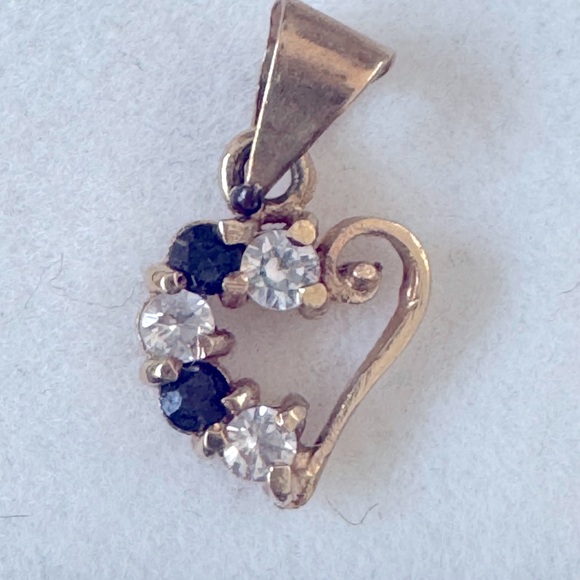 Heart charm/14kgold w/diamonds and sapphires.585 considered...